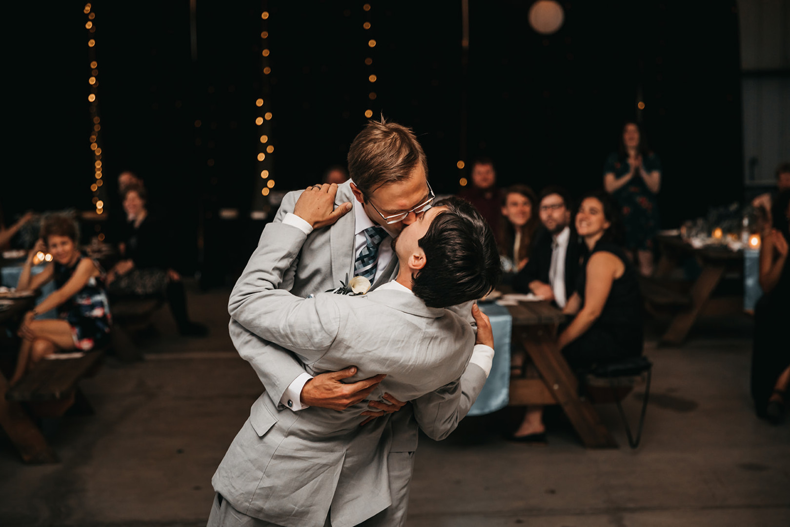 Rustic countryside spring wedding at California Woods Nature Preserve LGBTQ+ weddings gay wedding two grooms moody photojournalist nature first dance kiss