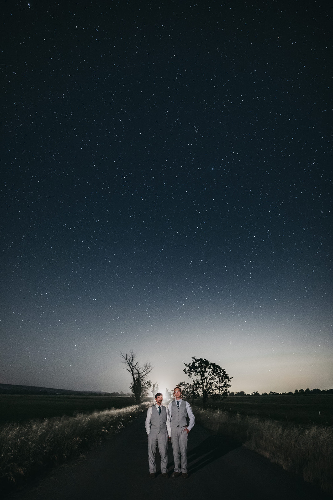 Rustic countryside spring wedding at California Woods Nature Preserve LGBTQ+ weddings gay wedding two grooms moody photojournalist nature meteor shower stars night sky