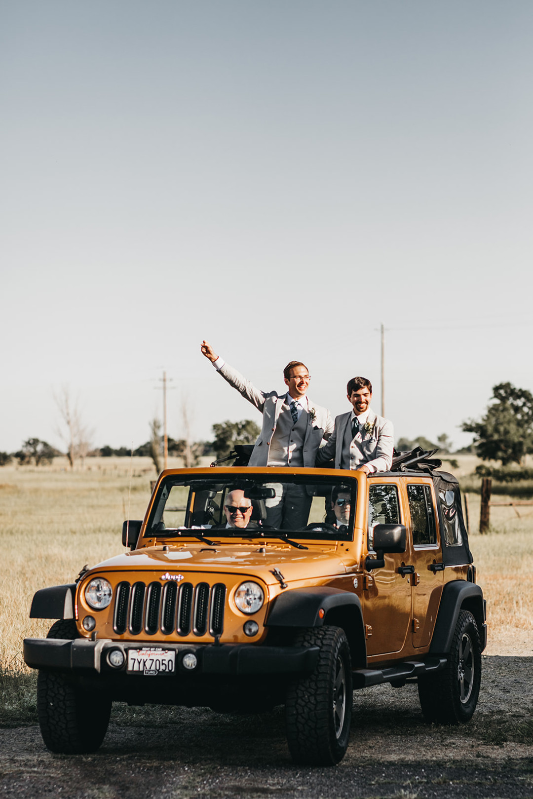 Rustic countryside spring wedding at California Woods Nature Preserve LGBTQ+ weddings gay wedding two grooms moody photojournalist nature Jeep