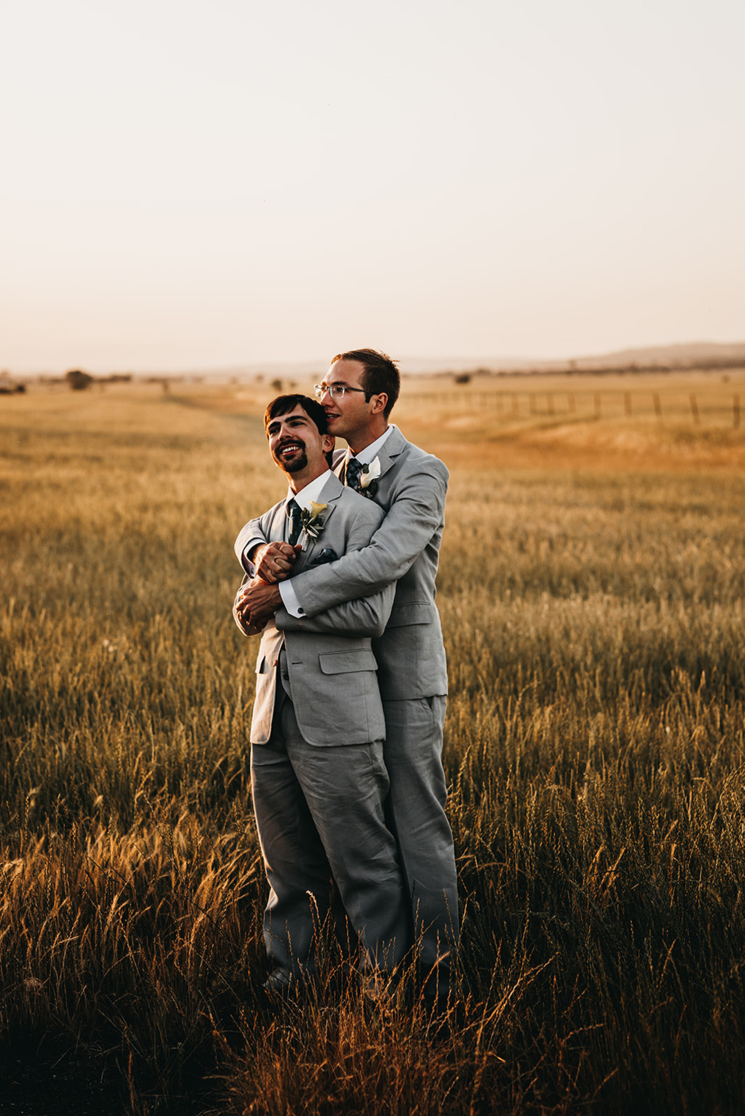Rustic countryside spring wedding at California Woods Nature Preserve LGBTQ+ weddings gay wedding two grooms moody photojournalist nature outside field