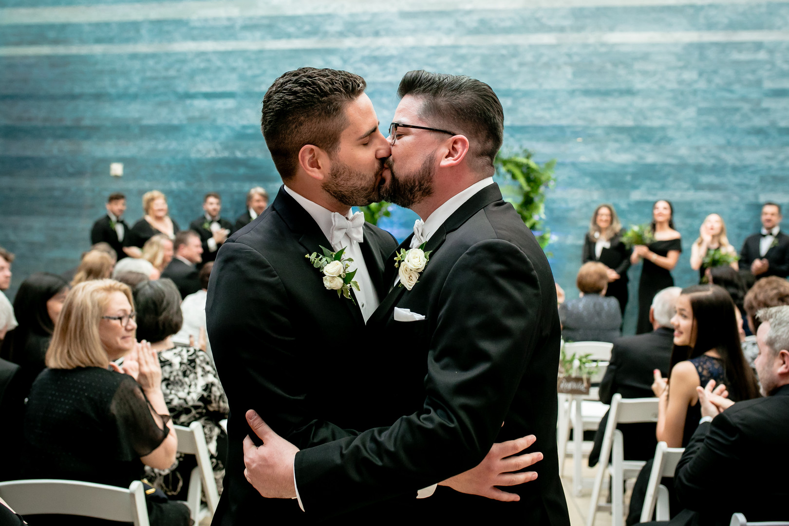 Black tie wedding at the Blanton Museum in Austin, Texas LGBTQ+ weddings two grooms luxury elegant kiss