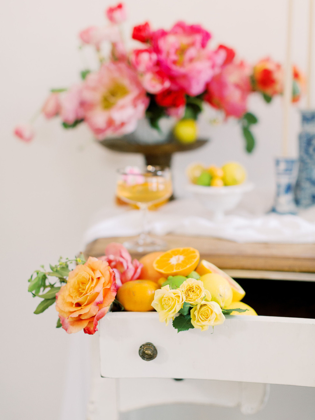 Summer citrus wedding inspiration at historic post office LGBTQ+ weddings two grooms gay wedding blue suit white gray suit orange blue bright colorful summery styled shoot