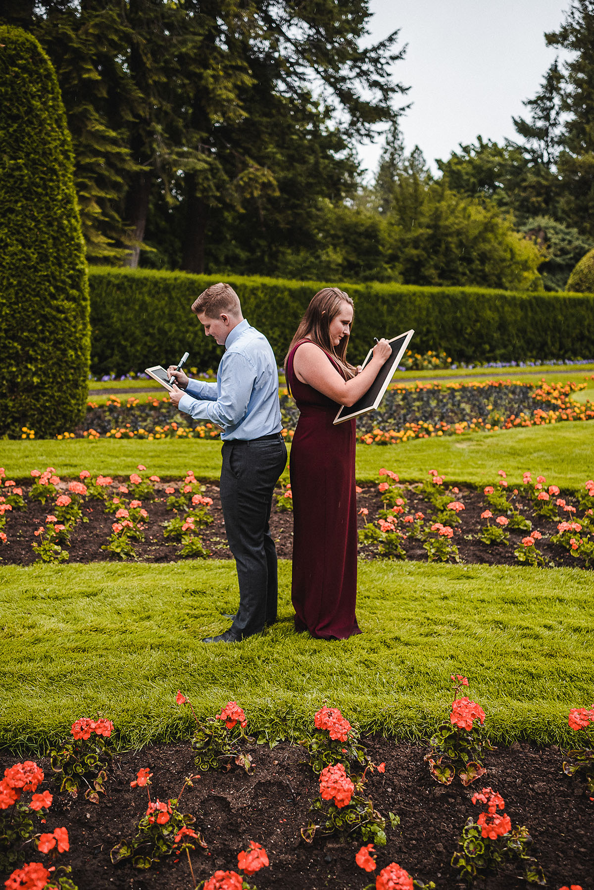 This couples' portrait session turned into the sweetest surprise proposal LGBTQ+ weddings engagements two brides Duncan Gardens Spokane Washington outdoor park engagement