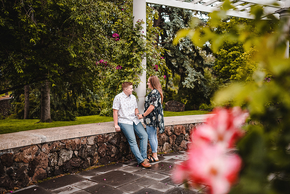 This couples' portrait session turned into the sweetest surprise proposal LGBTQ+ weddings engagements two brides Duncan Gardens Spokane Washington outdoor park engagement