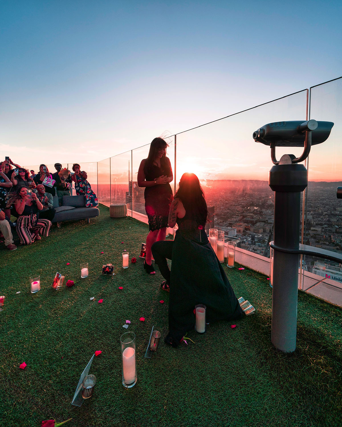 This romantic sunset proposal at OUE Skyspace has a beautiful backstory LGBTQ+ weddings engagements two brides skyline Los Angeles LA California
