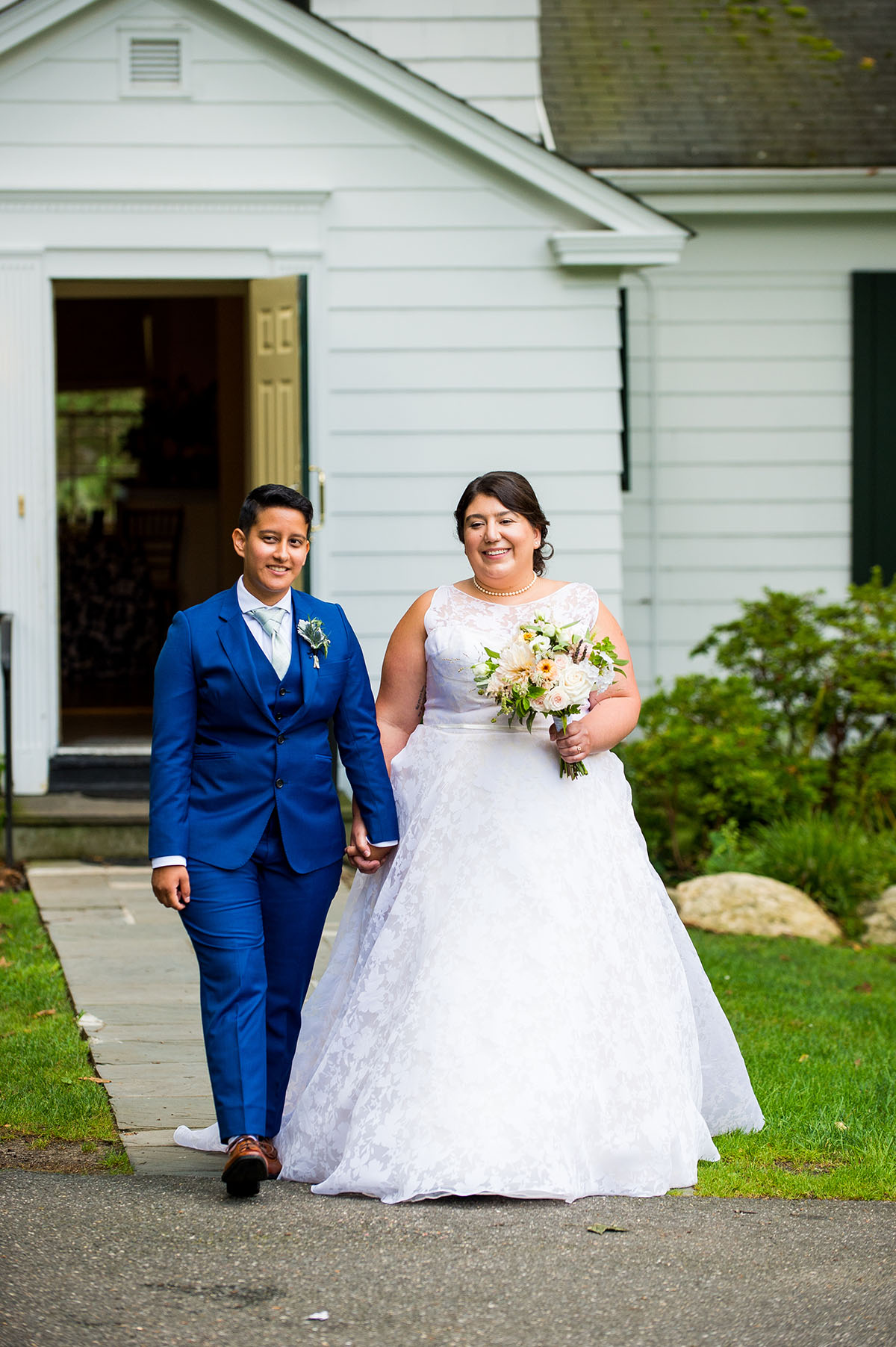Community was at the heart of this floral summer wedding LGBTQ+ weddings two brides queer lesbian wedding Long Island New York Bindle and Keep
