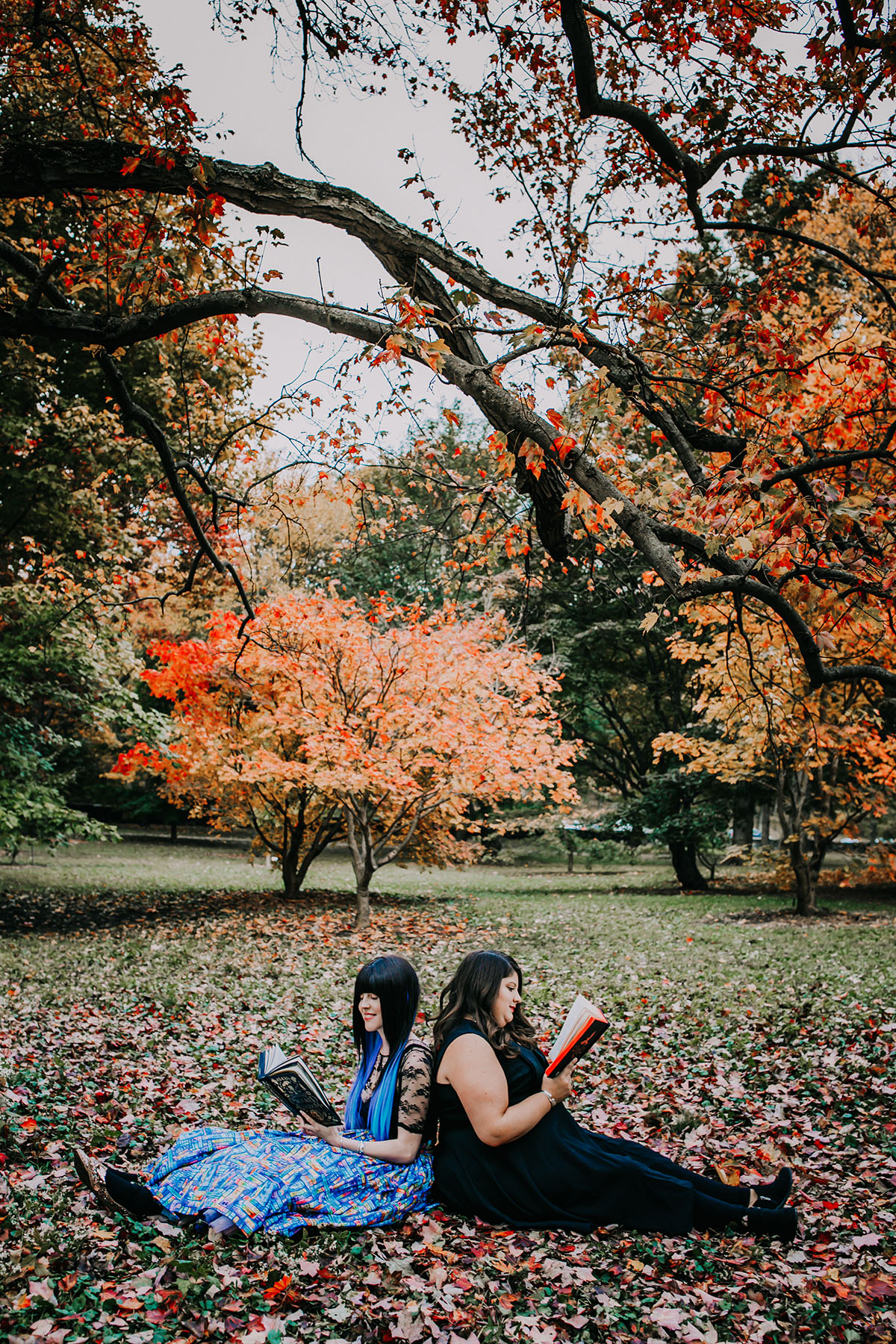 Why you should absolutely do a post-wedding photo shoot LGBTQ+ weddings engagements two brides lesbian couple newlywed photos foliage fall autumn october reading