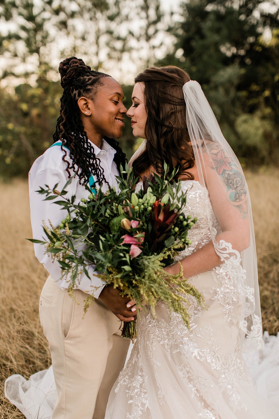 Bohemian winter elopement photos in Irmo, South Carolina LGBTQ+ weddings kiss elope intimate wedding celebration inspiration styled shoot real couple two brides