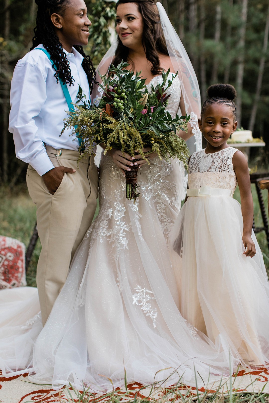 Bohemian winter elopement photos in Irmo, South Carolina LGBTQ+ weddings kiss elope intimate wedding celebration inspiration styled shoot real couple two brides daughter