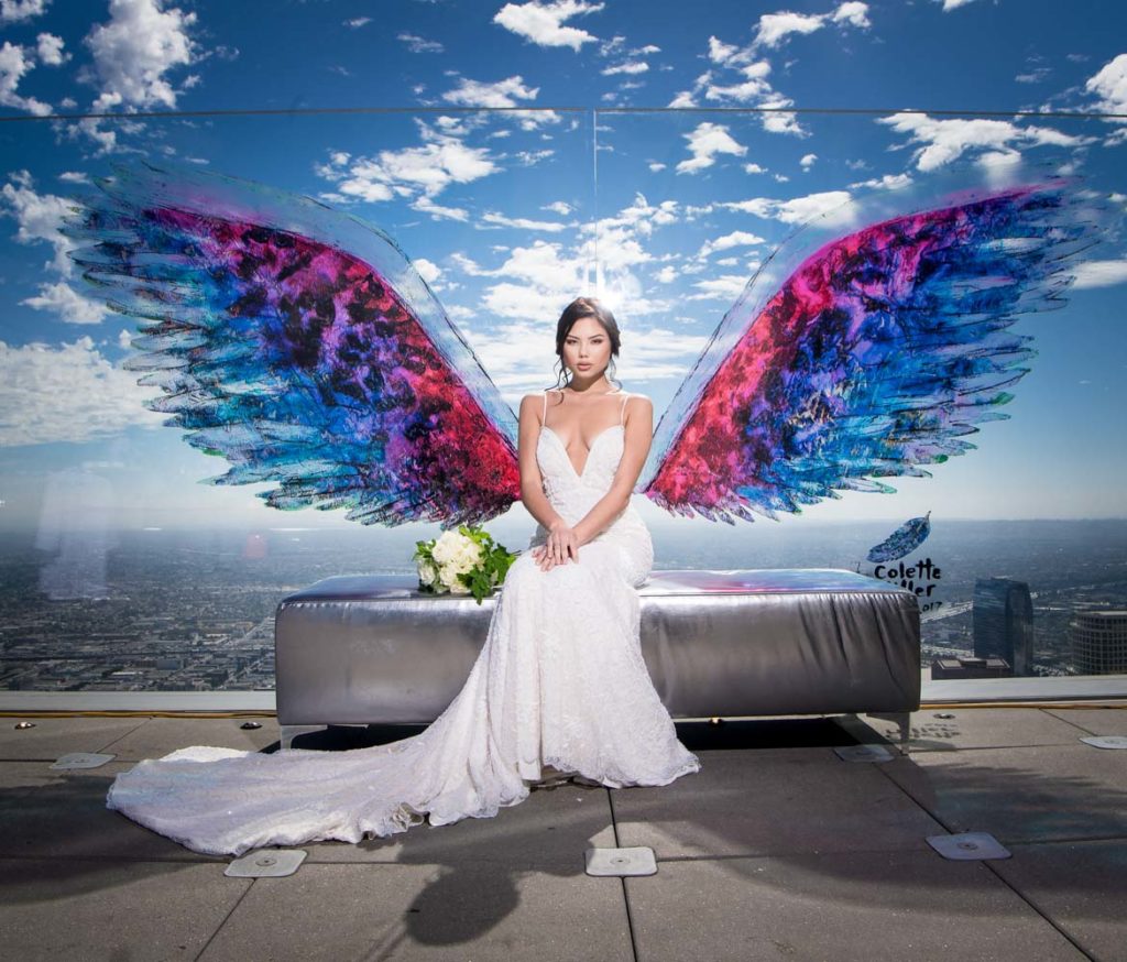 OUE Skyspace LA wedding venue angel wings painted on glass