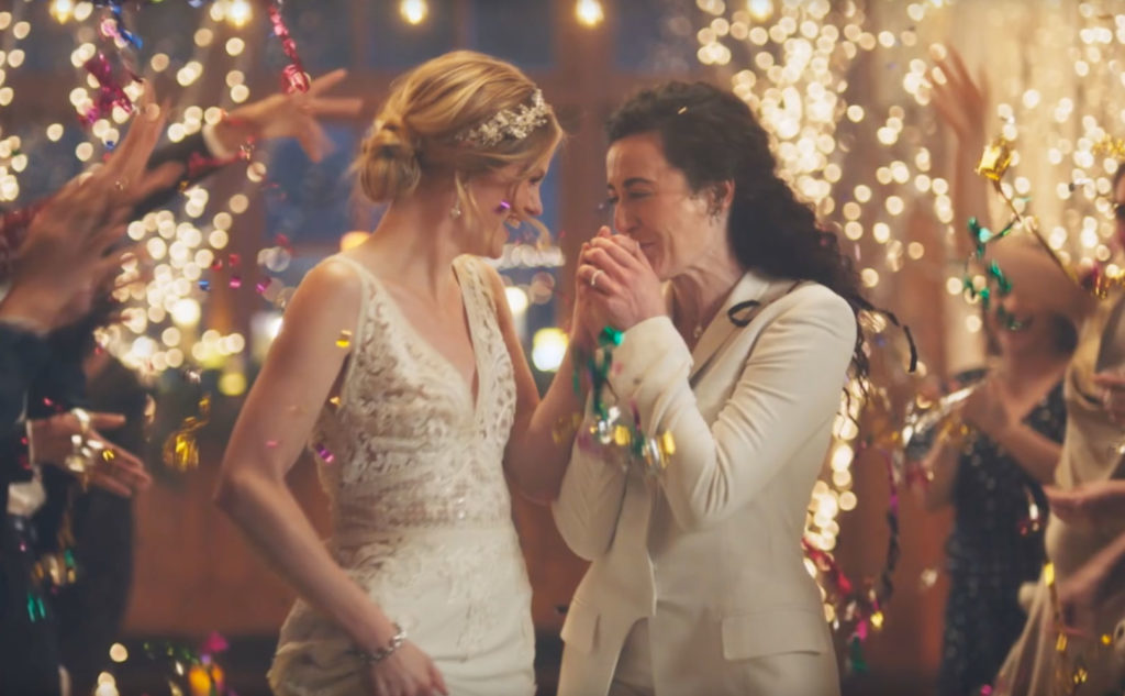 Zola's same-sex wedding commercial was banned from Hallmark Channel. 