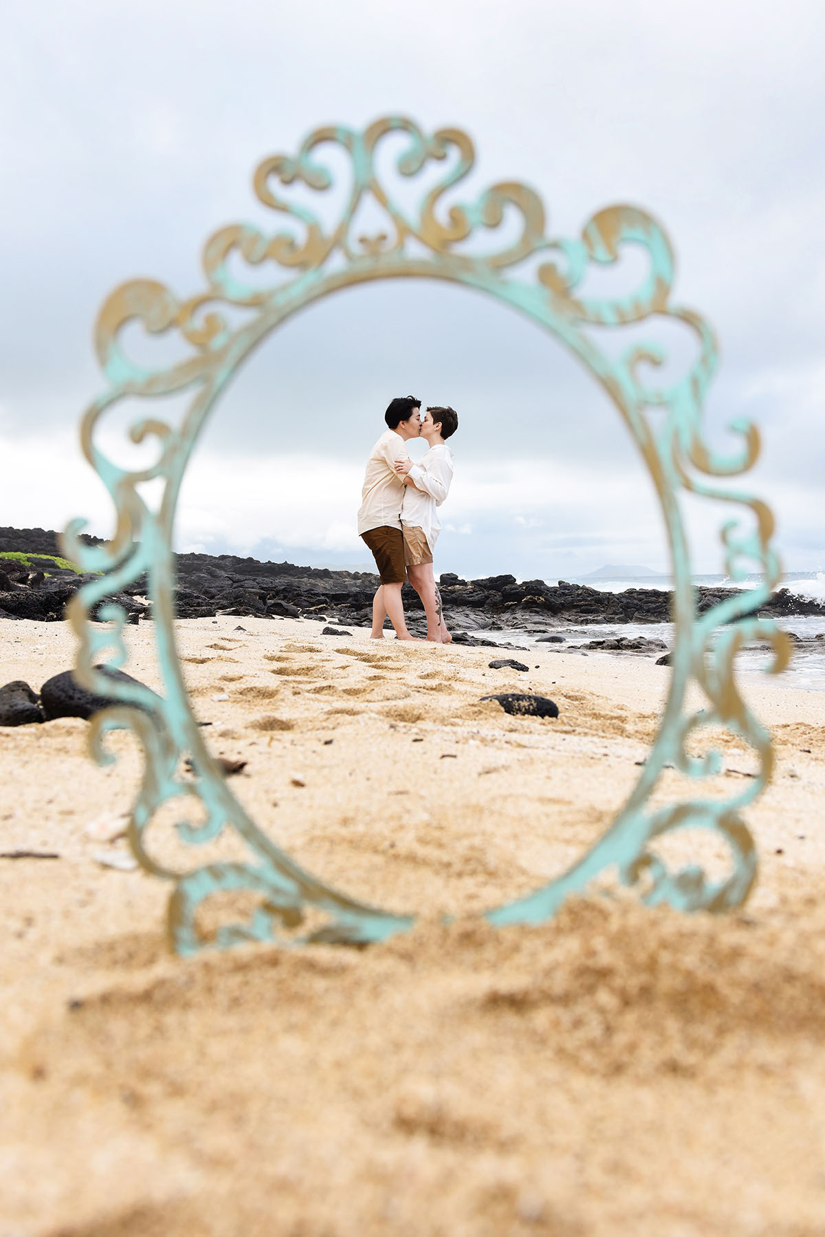 Beach destination wedding and honeymoon in Honolulu, Hawaii LGBTQ+ weddings elopements legal ceremony courthouse cliffside ocean