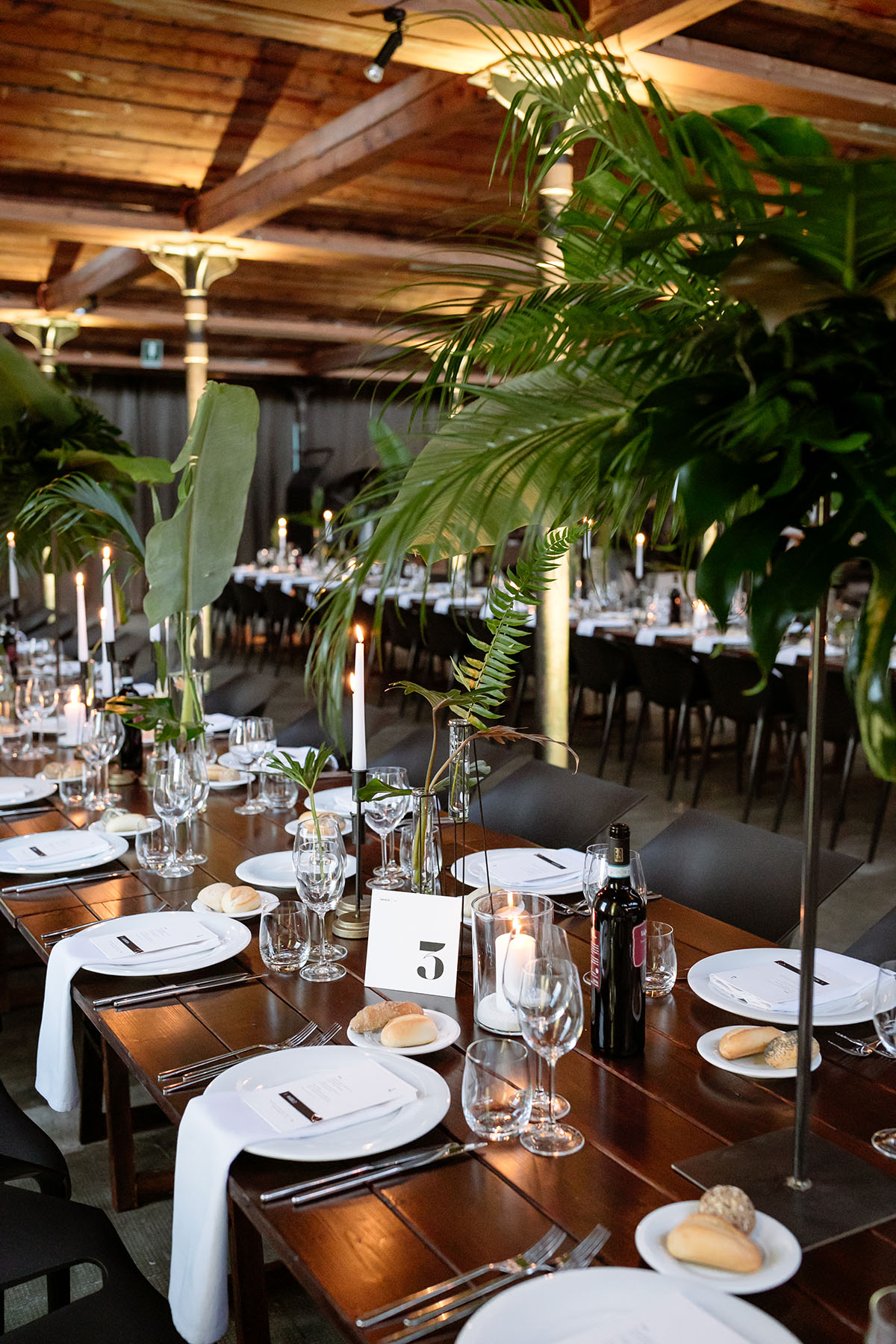 Black and white industrial wedding with jungle themed decor LGBTQ+ weddings two grooms gay wedding black tie chic modern Italy