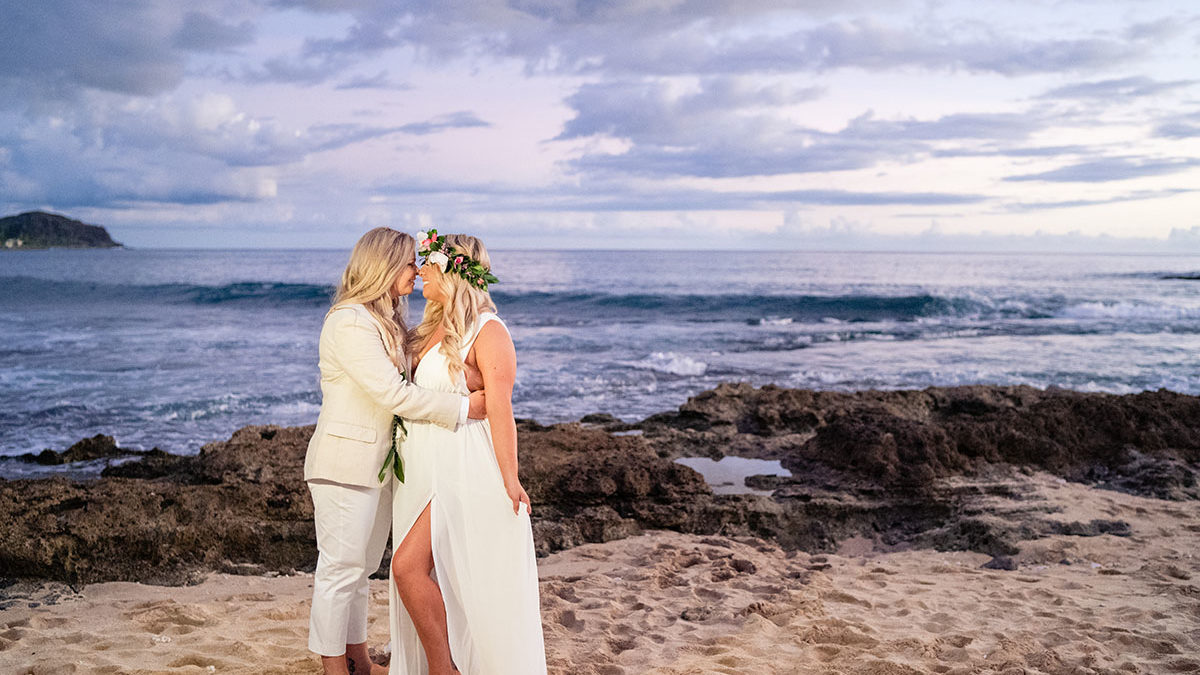 Colorful, floral tropical beach destination wedding in Makaha, Hawaii
