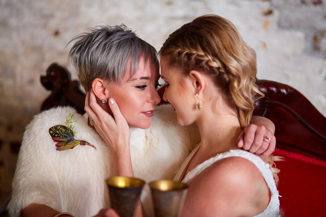 Modern romantic fall wedding inspiration in Charleston, South Carolina LGBTQ+ weddings styled shoot two brides lesbian wedding red deep hues vintage