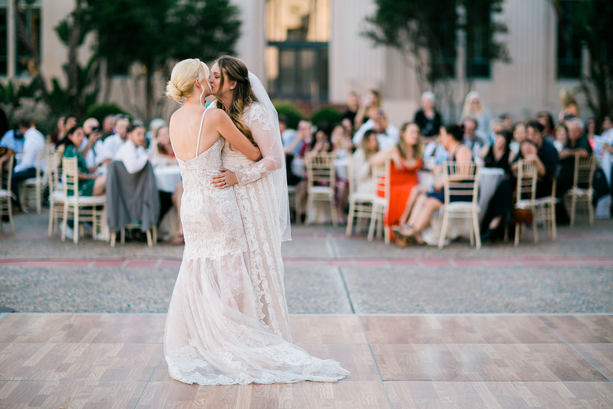 Whimsical, rustic waterfront wedding in San Diego, California two brides LGBTQ+ weddings sunny succulents first dance