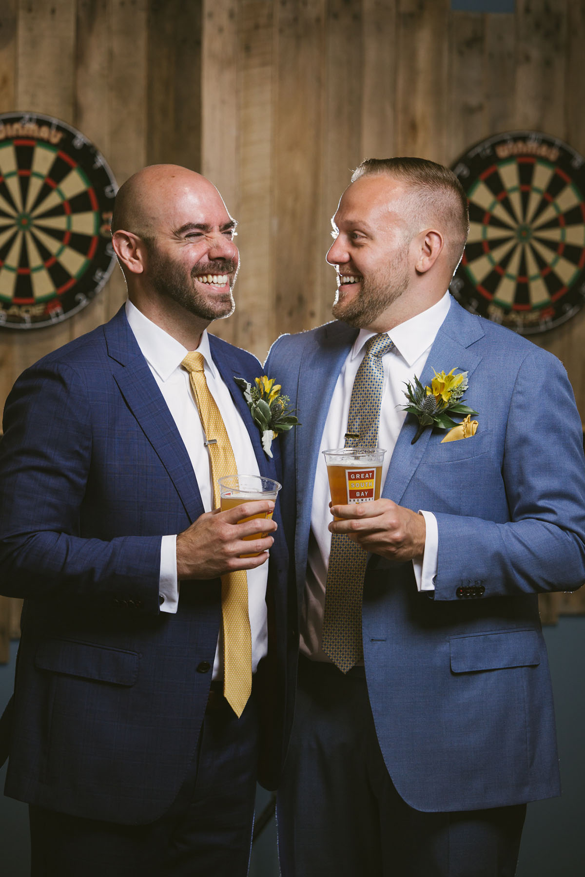 Waterfront brewery elopement at The Piermont in Babylon, New York LGBTQ+ weddings two grooms gay wedding succulents beach terrariums blue tuxedos
