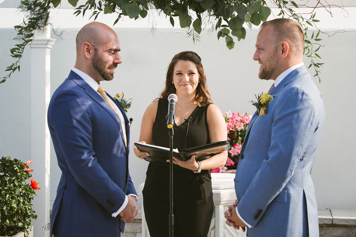 Waterfront brewery elopement at The Piermont in Babylon, New York LGBTQ+ weddings two grooms gay wedding succulents beach terrariums blue tuxedos vows