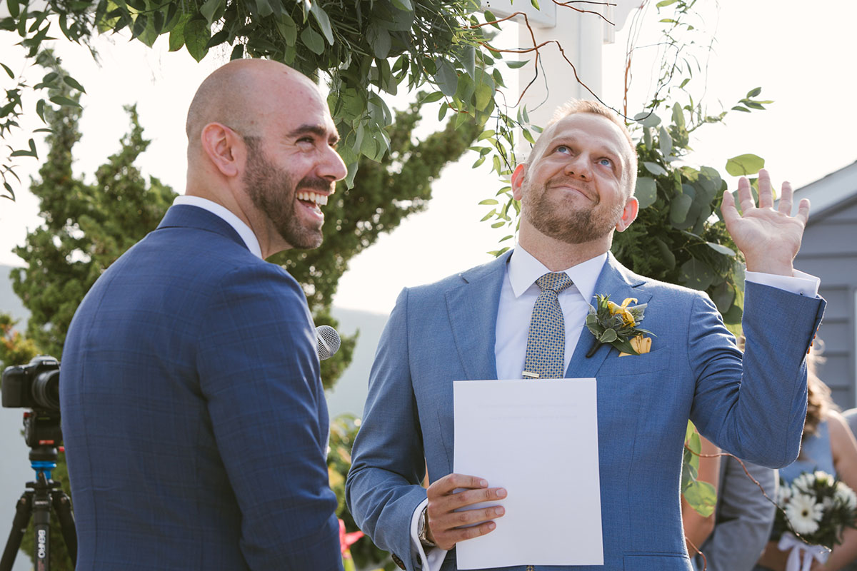 Waterfront brewery elopement at The Piermont in Babylon, New York LGBTQ+ weddings two grooms gay wedding succulents beach terrariums blue tuxedos vows