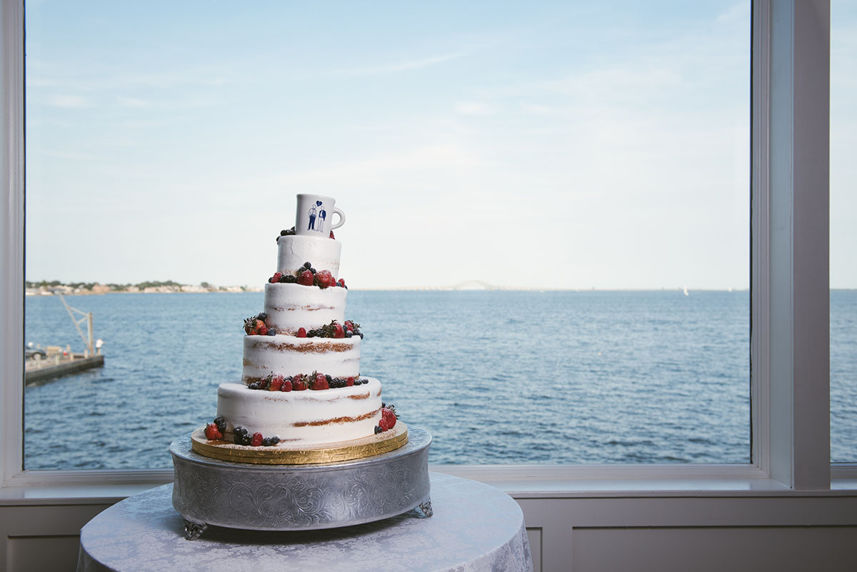 Waterfront brewery elopement at The Piermont in Babylon, New York LGBTQ+ weddings two grooms gay wedding succulents beach terrariums blue tuxedos cake