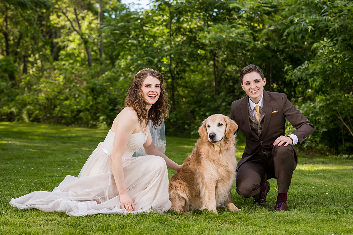 Rustic mountain wedding at The Red Barn at Hampshire College LGBTQ+ weddings two brides Amherst Massachusetts romantic cozy dog