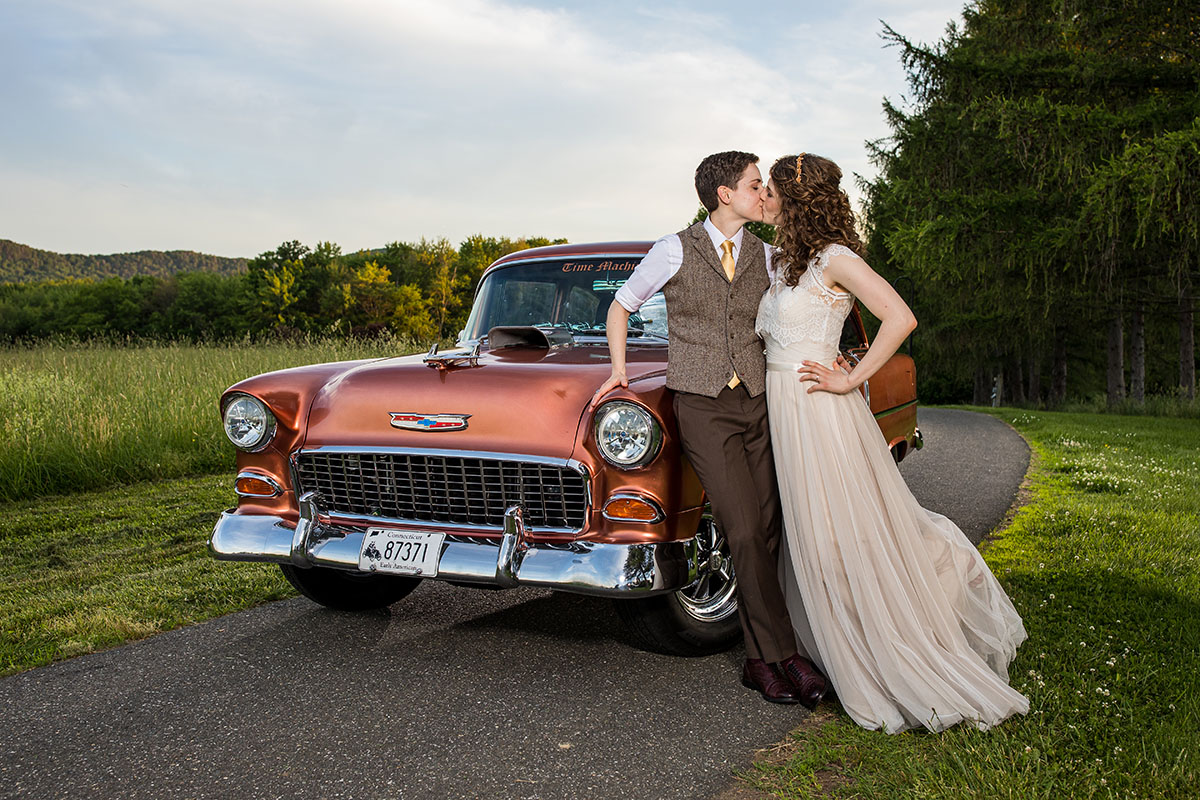 Rustic mountain wedding at The Red Barn at Hampshire College LGBTQ+ weddings two brides Amherst Massachusetts romantic cozy car vintage