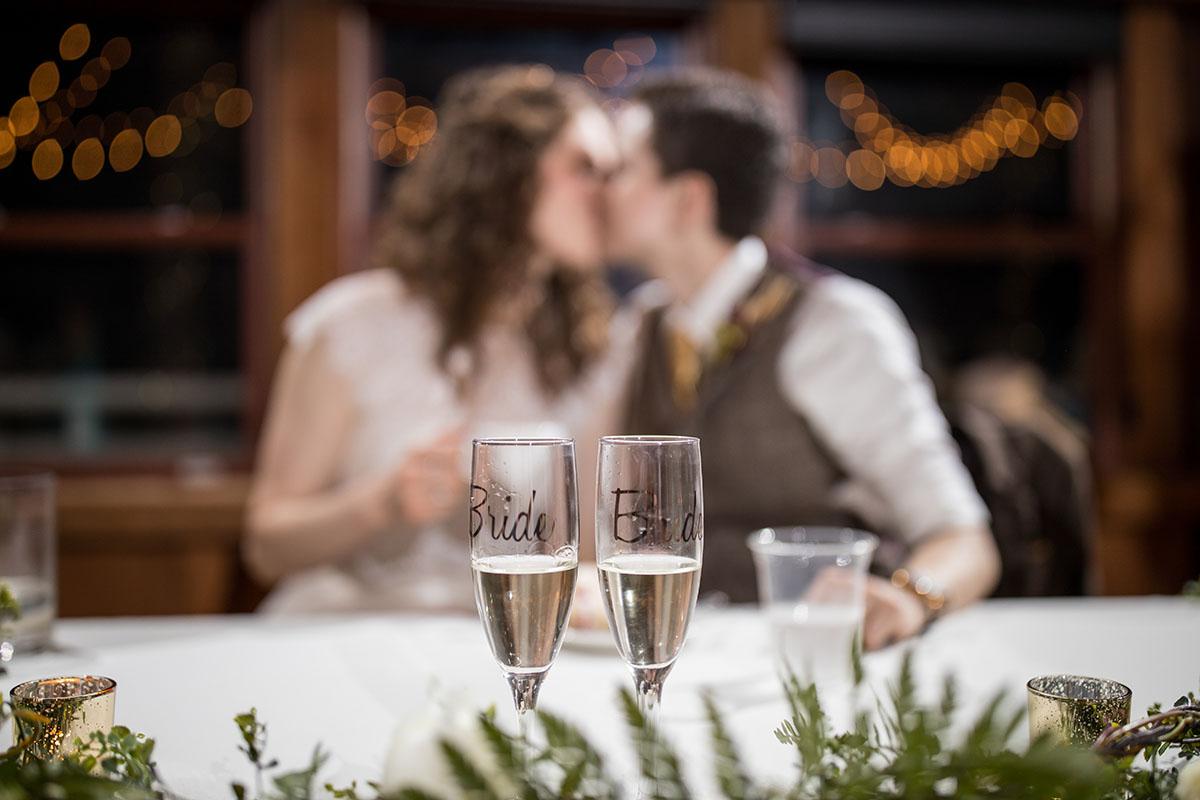 Rustic mountain wedding at The Red Barn at Hampshire College LGBTQ+ weddings two brides Amherst Massachusetts romantic cozy champagne