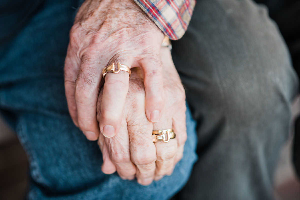 Couple celebrates 56 years of love with an in-home portrait session LGBTQ+ weddings engagements elderly couple two men husbands gay couple at home photos