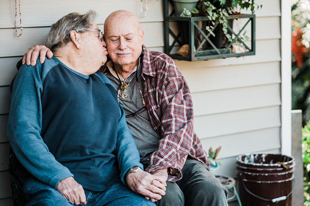 Couple celebrates 56 years of love with an in-home portrait session LGBTQ+ weddings engagements elderly couple two men husbands gay couple at home photos