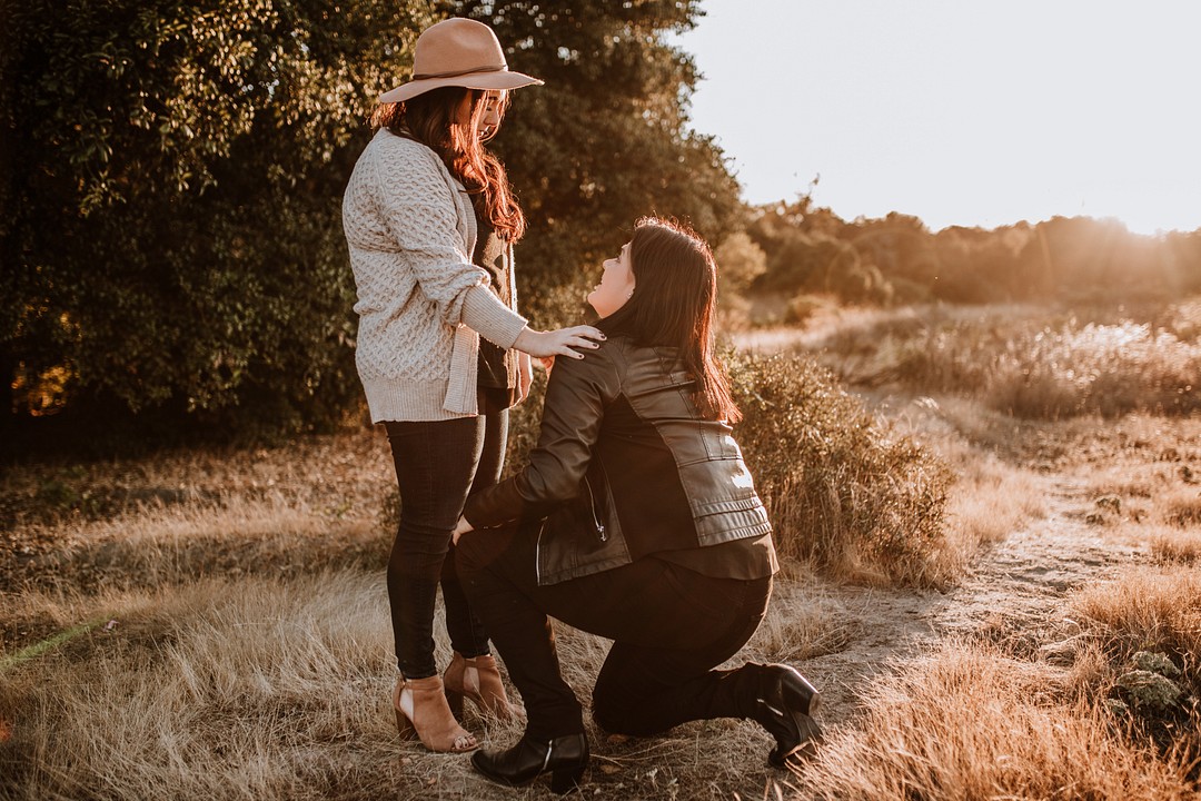 Golden hour proposal in the mountains of San Diego, California LGBTQ+ engagements weddings two brides engaged i do how she asked she said yes