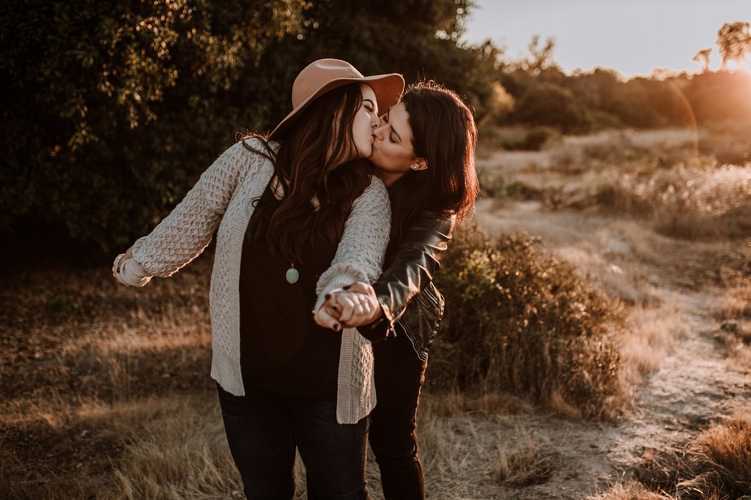 Golden hour proposal in the mountains of San Diego, California LGBTQ+ engagements weddings two brides engaged i do how she asked she said yes
