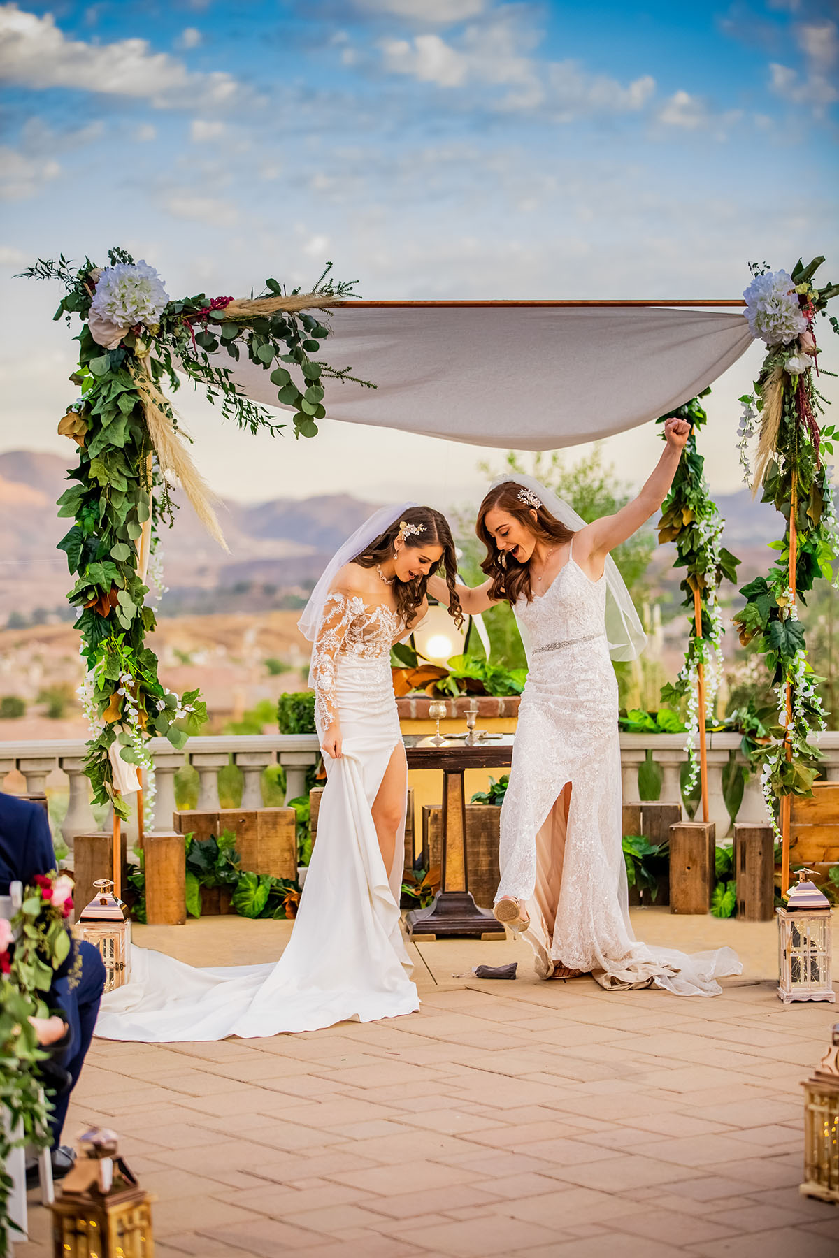 Rustic, elegant fall mountain wedding with interfaith Jewish ceremony LGBTQ+ weddings two brides Mrs. and Mrs. luxury lesbian wedding Southern California palm trees vows ceremony