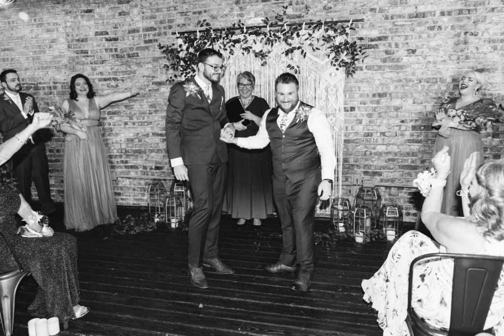 David + Andrew: Midwestern Pride Wedding Giveaway winners marry Photo Glass & Grain Photography published on Equally Wed gay grooms ceremony black and white photo