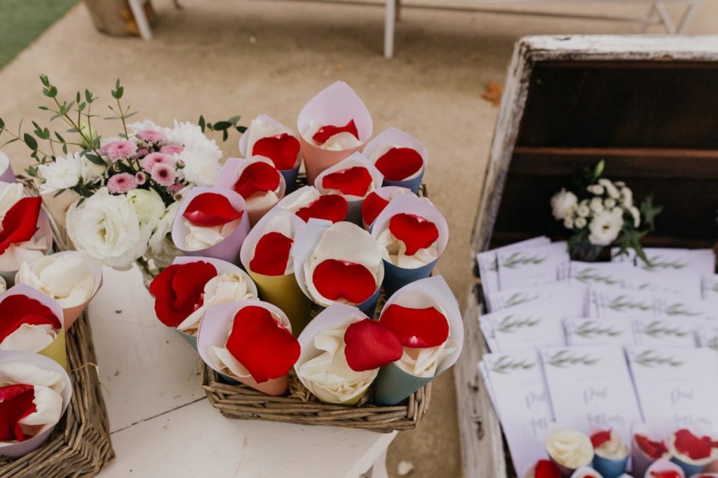 Anthony and Paul traveled from their hometown of Dublin, Ireland, to marry in a laid-back autumn wedding at the boho-lux Quinta Do Hespanhol in the wine region Torres Vedras 40 km north of Lisbon, Portugal. roses flower toss petals 