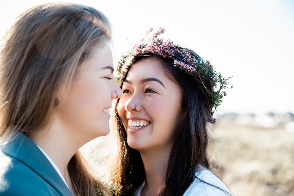 A romantic, dreamy elopement styled shoot in Vancouver, British Columbia Lorenza Tessari Photography Equally Wed LGBTQ+ weddings flower crown lesbian couple on beach