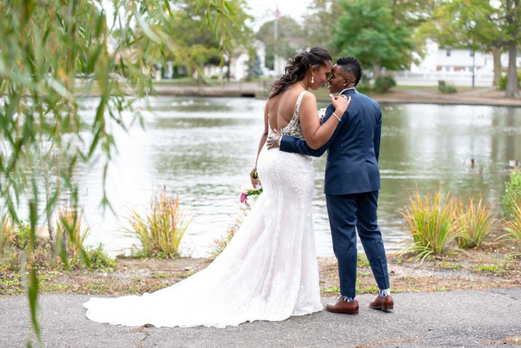 couple kiss purple outdoor New Jersey Black LGBTQ+ wedding