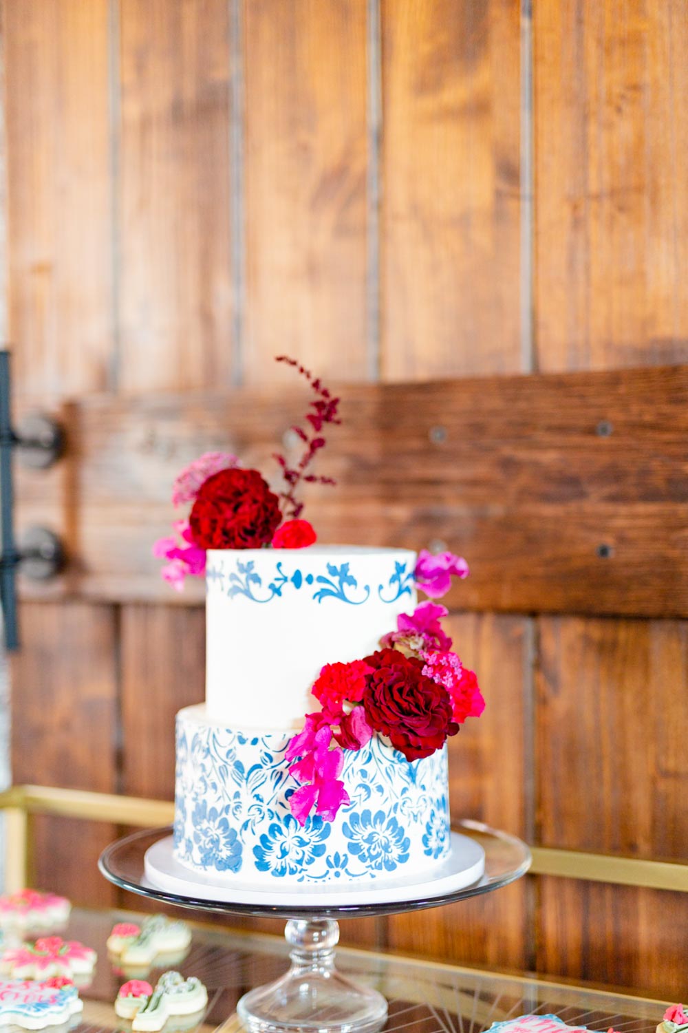 tropical wedding styled shoot inspiration kiss lesbian Kansas City two brides cake