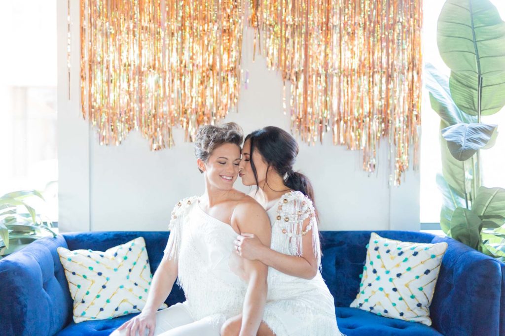 tropical wedding styled shoot inspiration kiss lesbian Kansas City two brides