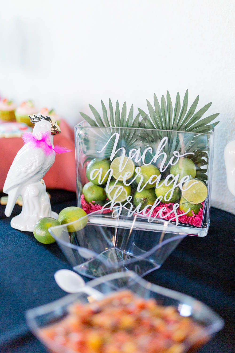 This tropical wedding styled shoot inspiration features a real same-sex couple whose Playa Del Carmen, Mexico, wedding was postponed from April to July because of covid-19. Brennan and Sylvanna wanted to bring the serene beauty of paradise to their hometown of Kansas City to celebrate with those who could not attend the wedding.