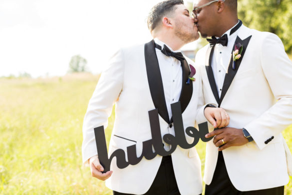 Tavion + Andrew: A Greenville, South Carolina, summer LGBTQ+ wedding with rose petal exit hubby sign