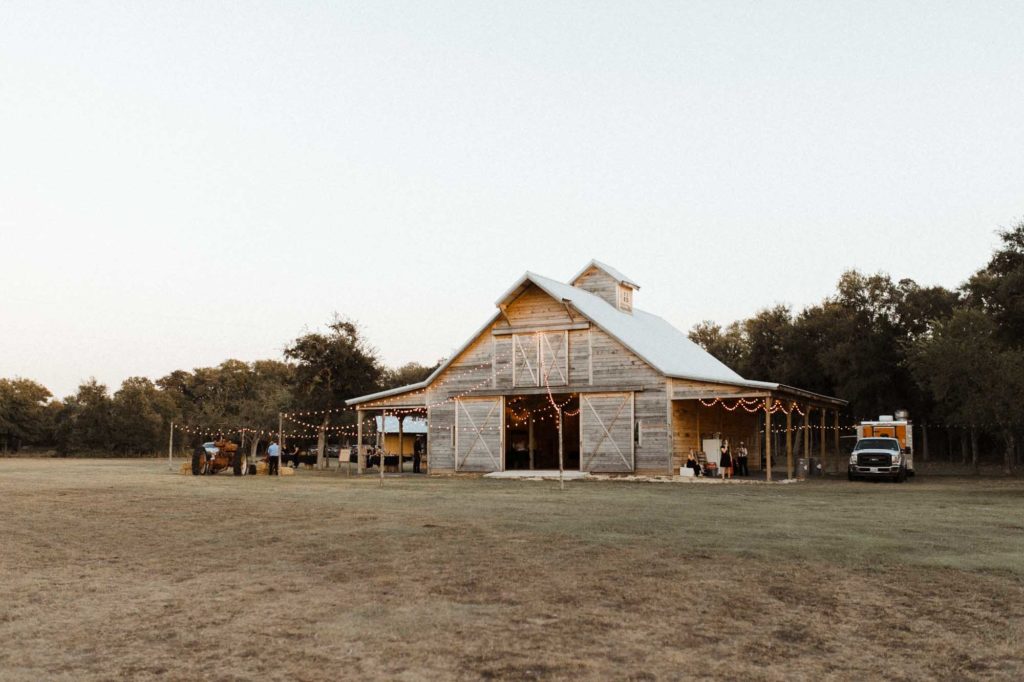 Beautifully gothic Texas wedding with creative details, photo by Leah Thomason Photography, featured on Equally Wed, the LGBTQ+ wedding magazine barn wedding venue