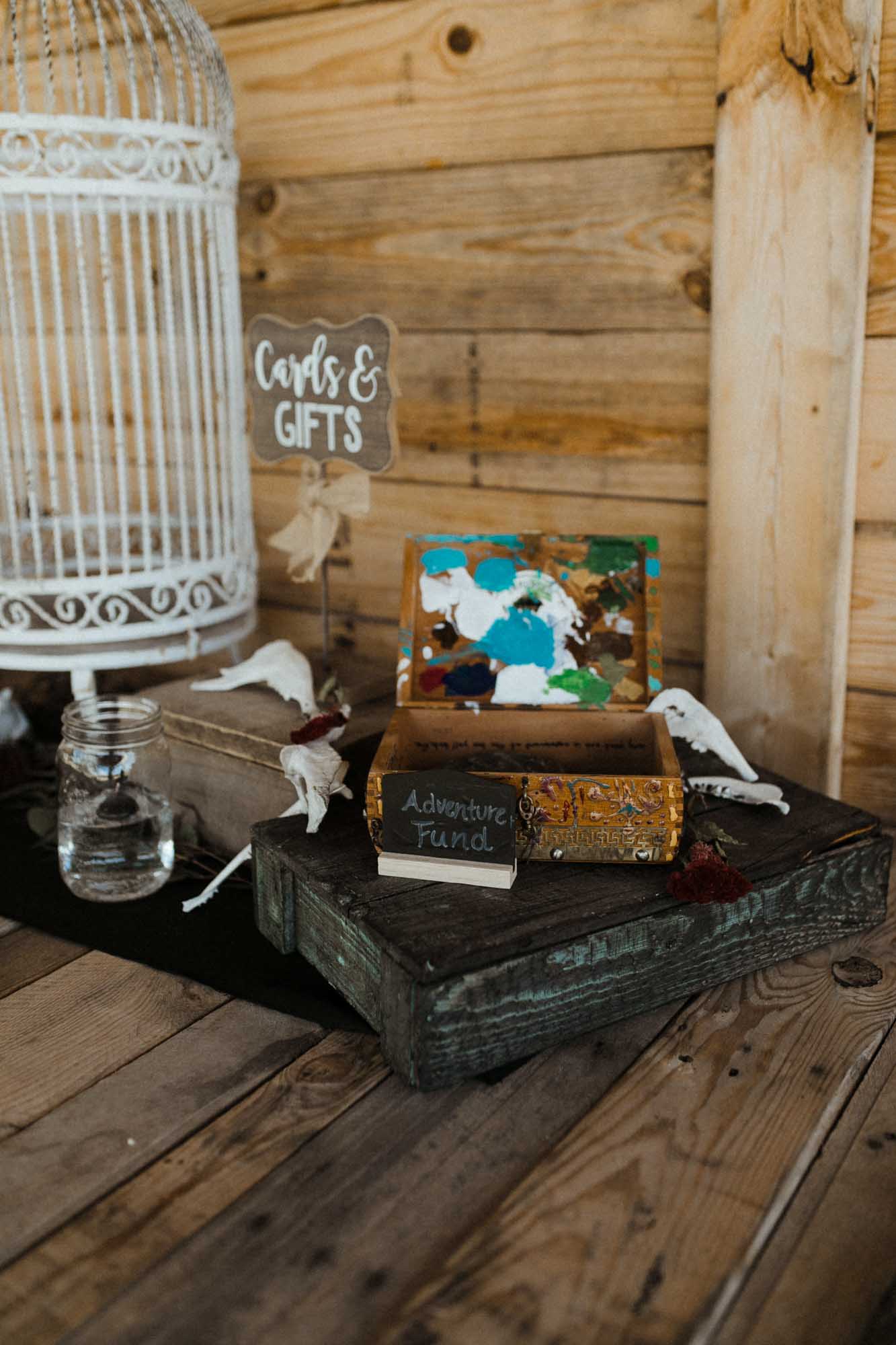 cards and gifts with box for adventure fund Beautifully gothic Texas wedding with creative details, photo by Leah Thomason Photography, featured on Equally Wed, the LGBTQ+ wedding magazine 