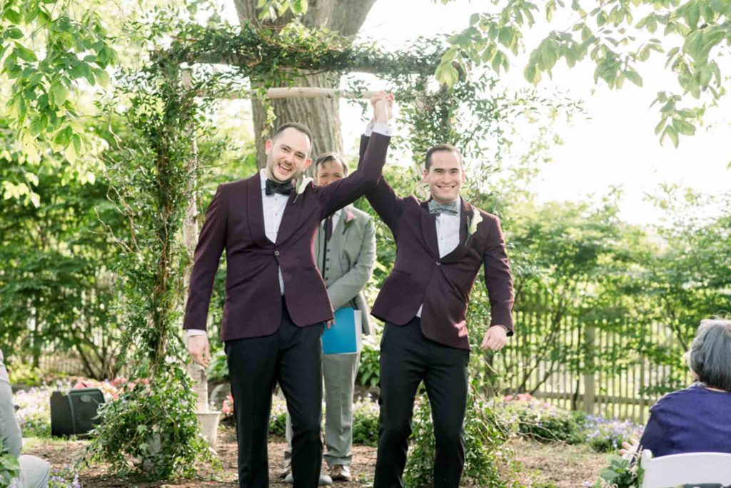 just married gay grooms LGBTQ+ wedding featured on Equally Wed magazine with two grooms Brian + Brett: Hudson Valley garden wedding with shades of purple Upasana Mainali Photography outdoor wedding ceremony