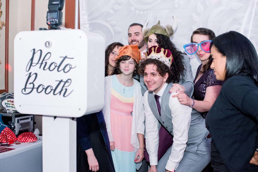 photo booth LGBTQ+ wedding featured on Equally Wed magazine with two grooms Brian + Brett: Hudson Valley garden wedding with shades of purple Upasana Mainali Photography outdoor wedding ceremony