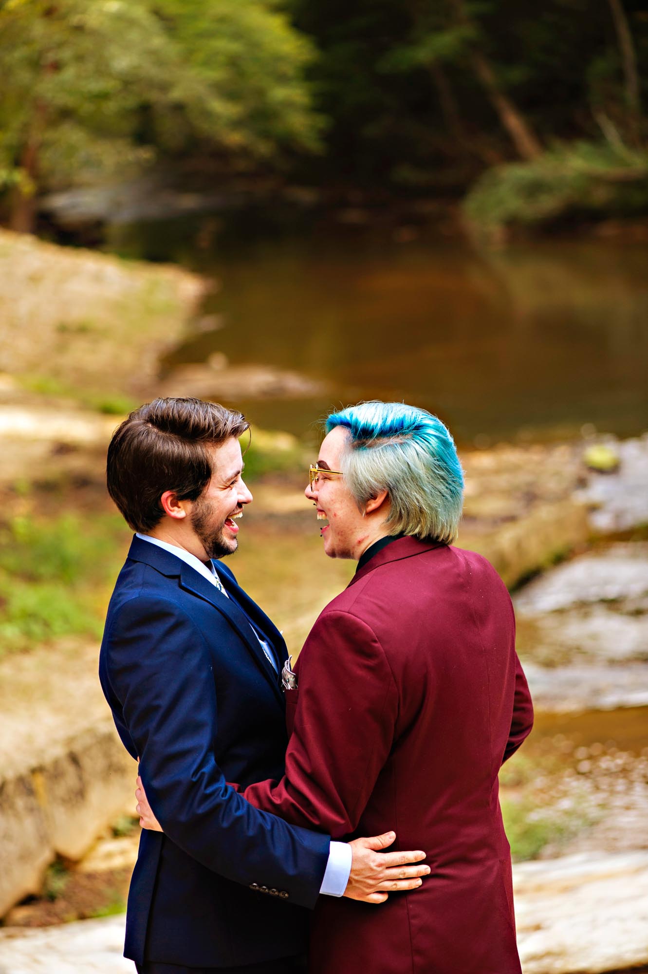 LGBTQ+ couple celebrates their magical DIY wedding at North Carolina vineyard. Photo by Brooke Mayo Photography. Featured on Equally Wed, the leading LGBTQ+ wedding magazine and vendor directory.