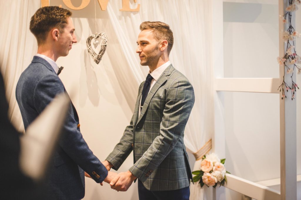 After a four-month engagement, Joel and Thomas married in a Sydney, Australia, microwedding. Photo by Chris Gray Photomedia. Published on Equally Wed, the world's leading LGBTQ+ wedding magazine and wedding directory of LGBTQ+ inclusive wedding vendors and venues. pictured: wedding vows