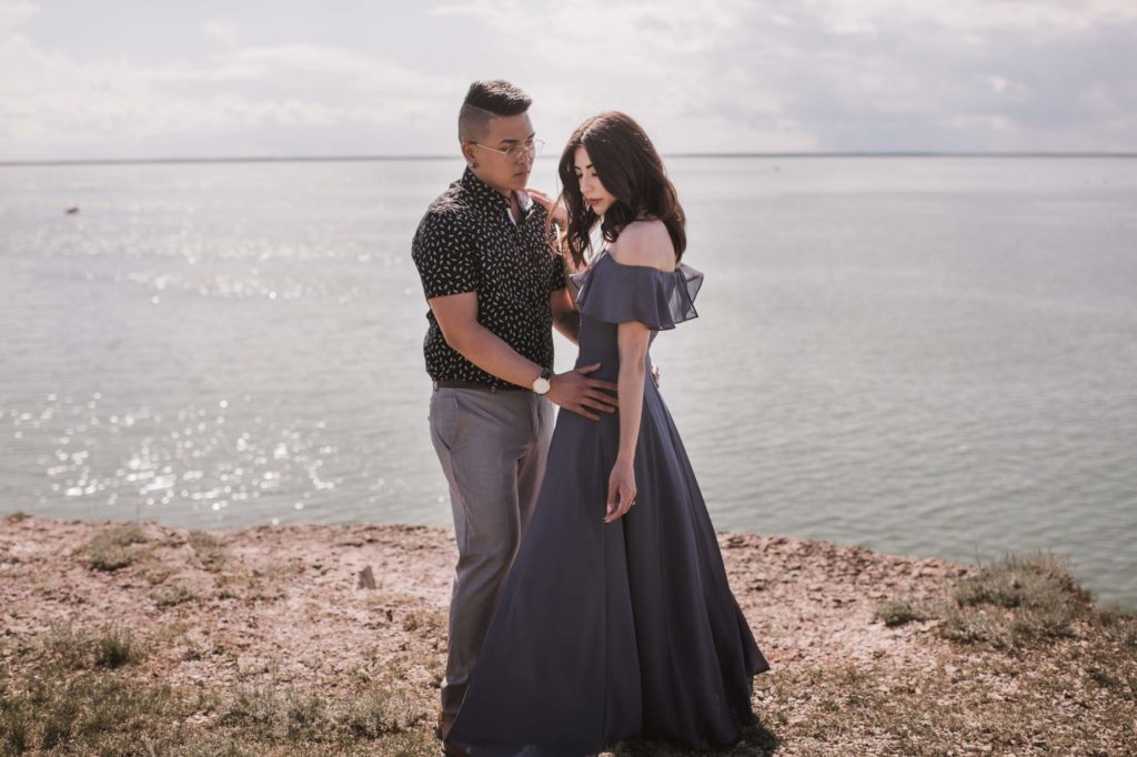 Dreamy summer engagement photo session in Steep Rock, Manitoba with poses and attire based on Korean drama, Guardian: The Lonely and Lost God Photo by Christina W. Kroeker Creative Published on Equally Wed, the leading LGBTQ+ wedding website