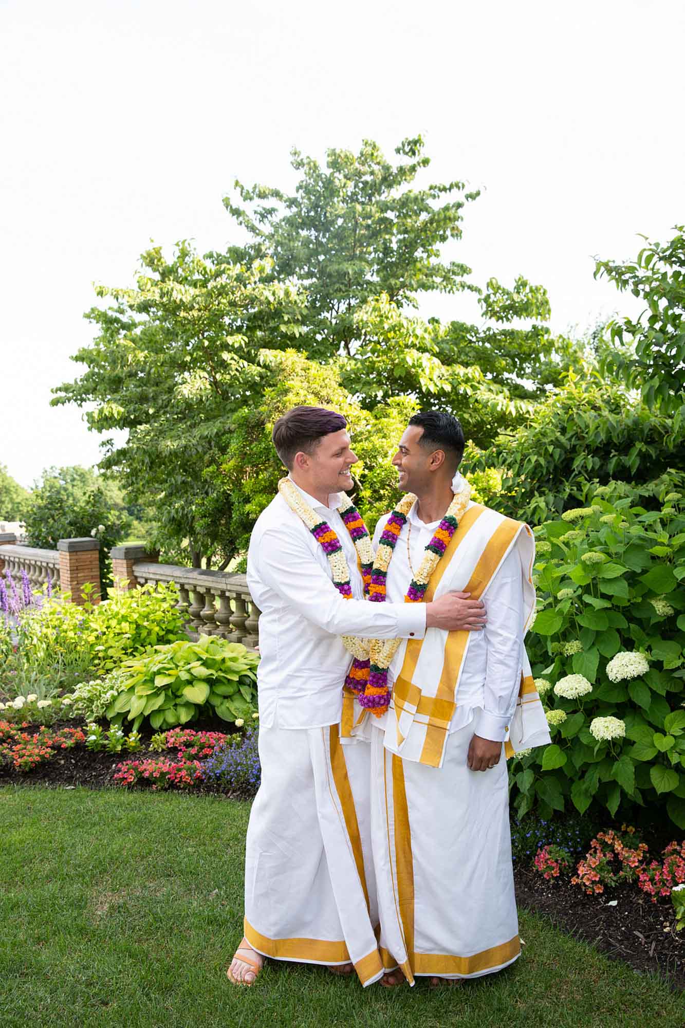 A bold, colorful wedding with Indian traditions and outfit changes | Lorenzini Wedding Photography | Featured on Equally Wed, the leading LGBTQ+ wedding magazine