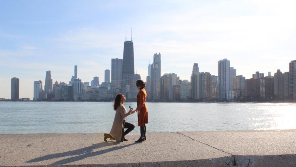 A gorgeous proposal on the shores of Lake Michigan | Featured on Equally Wed, the leading LGBTQ+ wedding magazine 