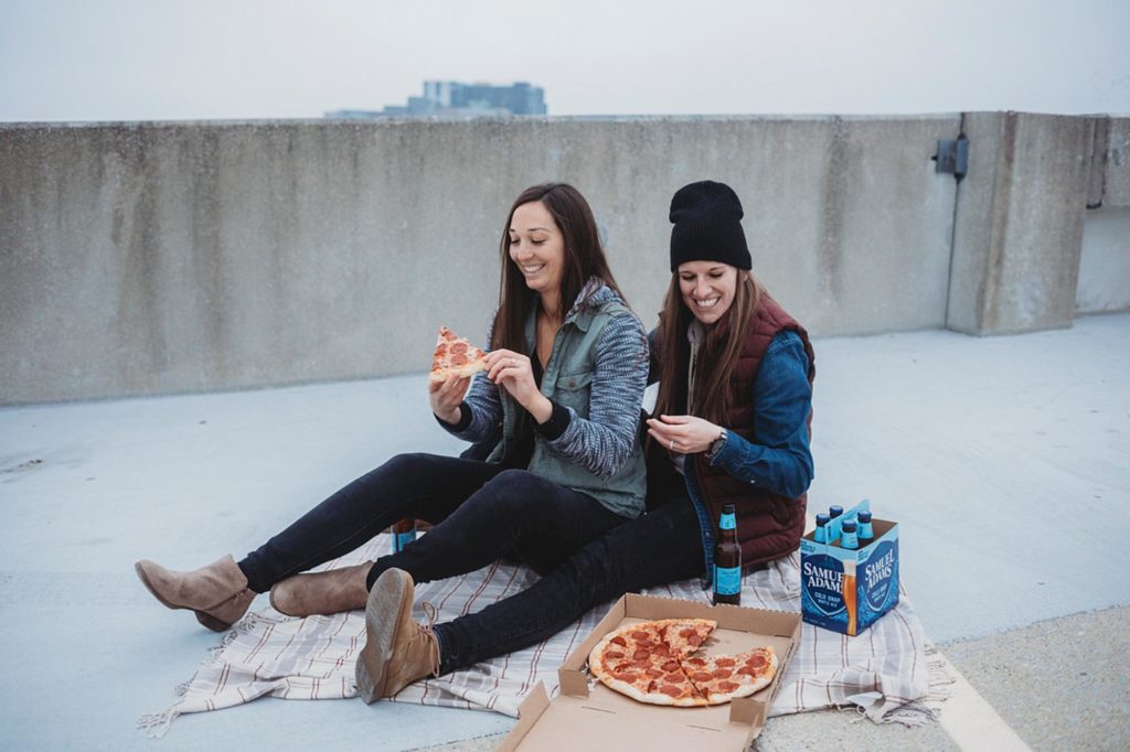 Casual rooftop engagement session with pizza and beer | Samantha Mitchell Photography | Featured on Equally Wed, the leading LGBTQ+ wedding magazine